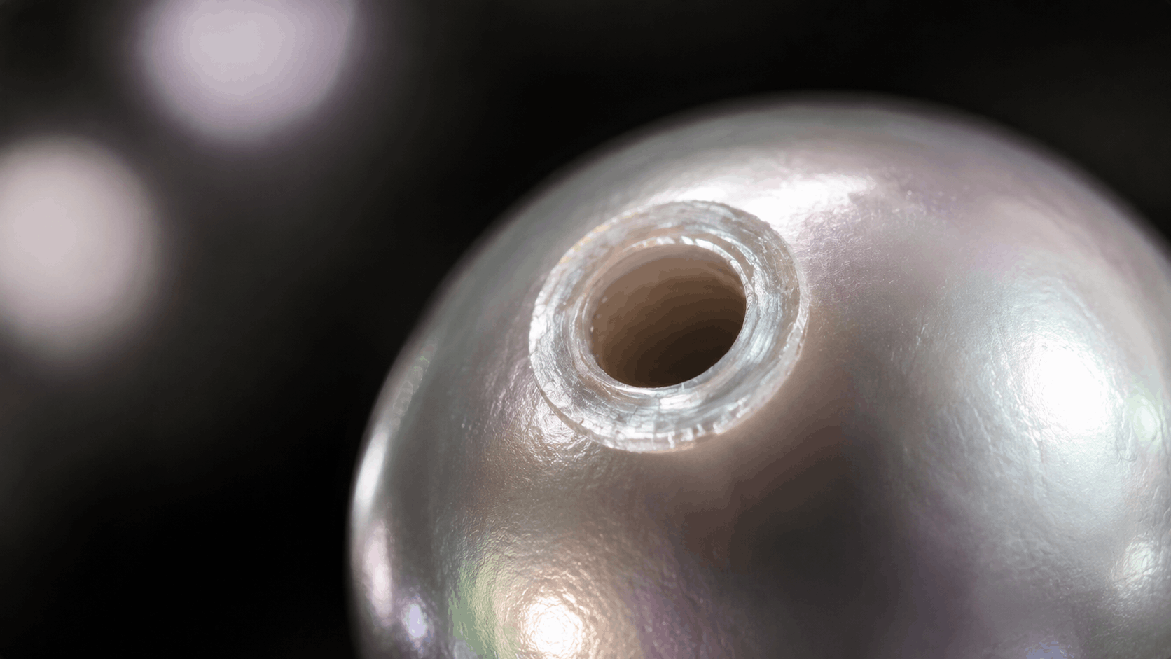 04. The Drill Hole Test - How to Tell If a Pearl Is Real on a Strand